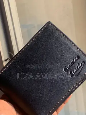 Bifold Wallet Is Crafted From Genuine Black Leather