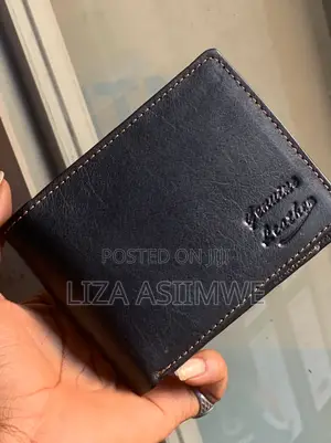 Bifold Wallet Is Crafted From Genuine Black Leather