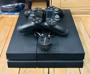 Sony Playstation 4 Standard Ps4. Chipped With 12 Games 2 Controllers