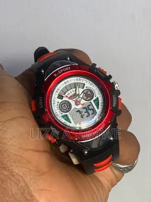 Kids Sports Watch With A Durable Black Strap And A Vibrant Red Bezel