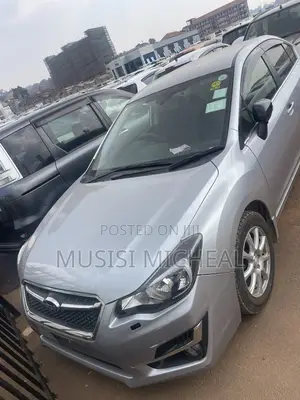 Subaru Impreza 2.0i Limited PZEV 4dr Hatchback AWD (2.0L 4cyl CVT) 2015