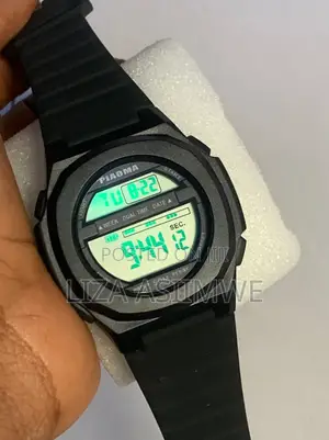 Men’S Digital Watch With a Black Silicone Strap and Is Water Resistant