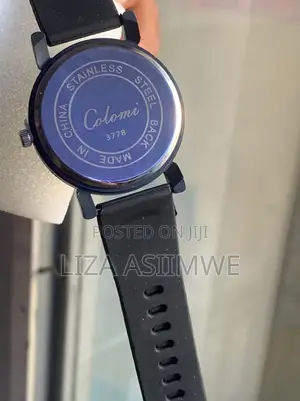 Colomi Quartz Wristwatch With A White Dial With Large Black Numbers
