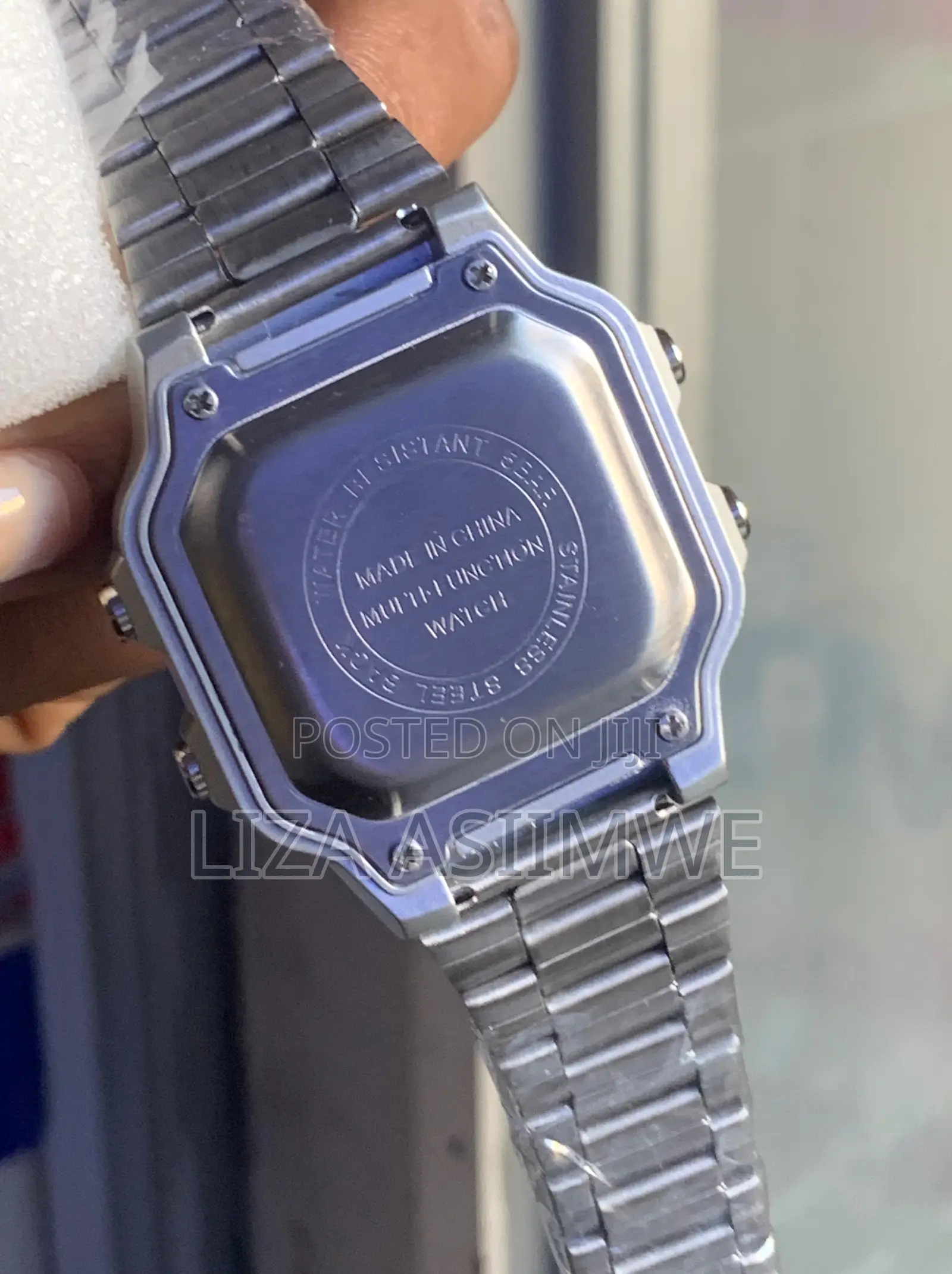 Branded Watch With Visuals of Skmei With a Square Digital Display