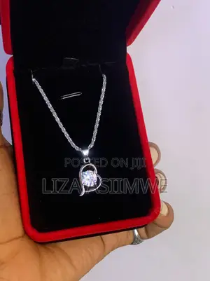 Lady’S Sparkling Zirconia Stone Set Within a Modern Open-Heart Pendant