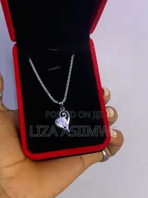 Lady’S Open Style Heart Design With a Brilliant Round Center Gemstone.