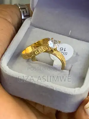 Wedding Ring Set With a Textured Band and a Solitaire Engagement Ring.