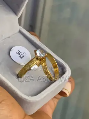 Wedding Ring Set With a Textured Band and a Solitaire Engagement Ring.