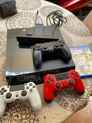 A Clean Chipped Ps4 Fat With 12 Games and 2 Controllers. Playstation