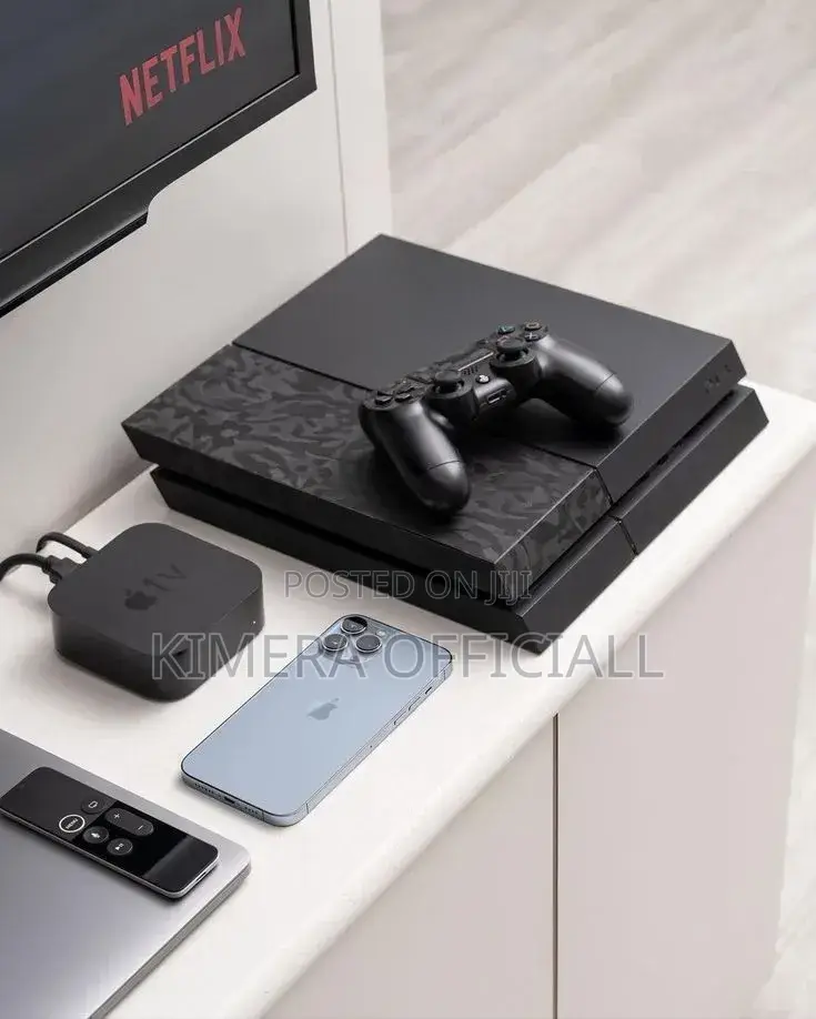 Ps4 With 12 Games and 2 Controllers. It's a Complete Package.