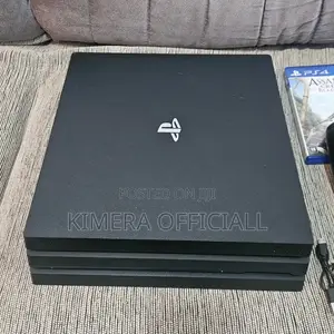 Super-Loaded Sony Ps4 Pro in Pristine Condition. It Has 35 Games, 1tb