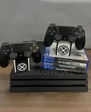 Fairly New Ps4 Pro. 1tb Console. Comes With 32 Games, 2 Controllers