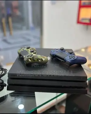 Ps4 Pro With 2 New Pads + 32 Games: Cheaper Than Kampala Traffic Fine