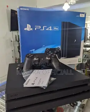 Get a Ps4 Pro With 2 Pads and 32 Games