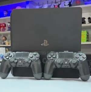 Fairly New, Almost Brand New Ps4 Slim With 2 Controllers and 10 Games