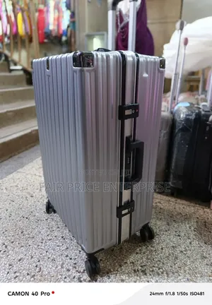 Quality Aluminum Plastic Suitcase. Medium Size. Gray Color