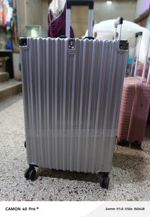 Quality Aluminum Plastic Suitcase. Medium Size. Gray Color