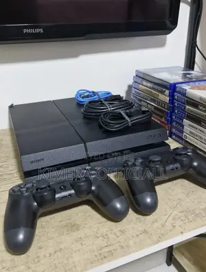 Ps4 Entertainment Bundle With 2 Pads and 13 Games Installed