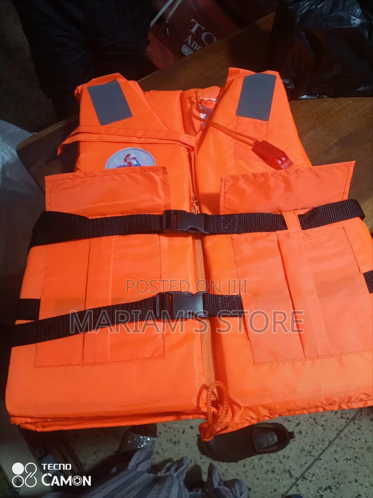 Life Jacket Features Black Safety Straps..