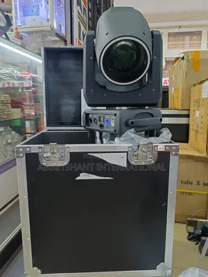 Moving Head Beam Light Designed for Stage Lighting, Disco, or Dj Use.