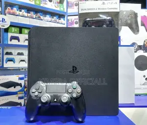 Playstation 4 Slim With 13 Games and 2 Controllers Included