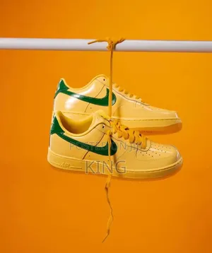 Nike Air Force 1 Low Qs "Patent" Sneakers in the Topaz Gold