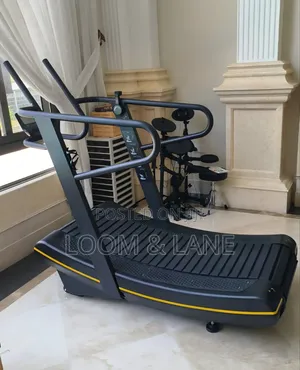 Non-Motorized, Self-Powered Curved Treadmill