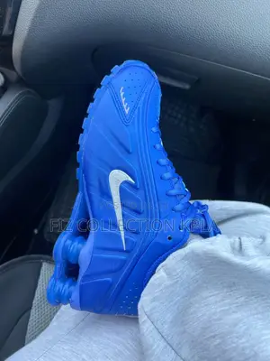 Nike Shox R4 in the "Racer Blue and Metallic Silver" Colorway.