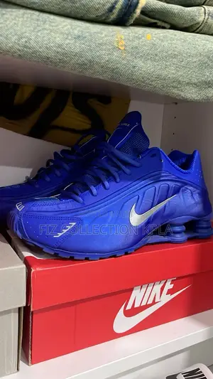 Nike Shox R4 in the "Racer Blue and Metallic Silver" Colorway.