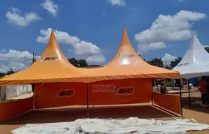 An Orange Tent With One Long Cover and and 2 Small Side Covers