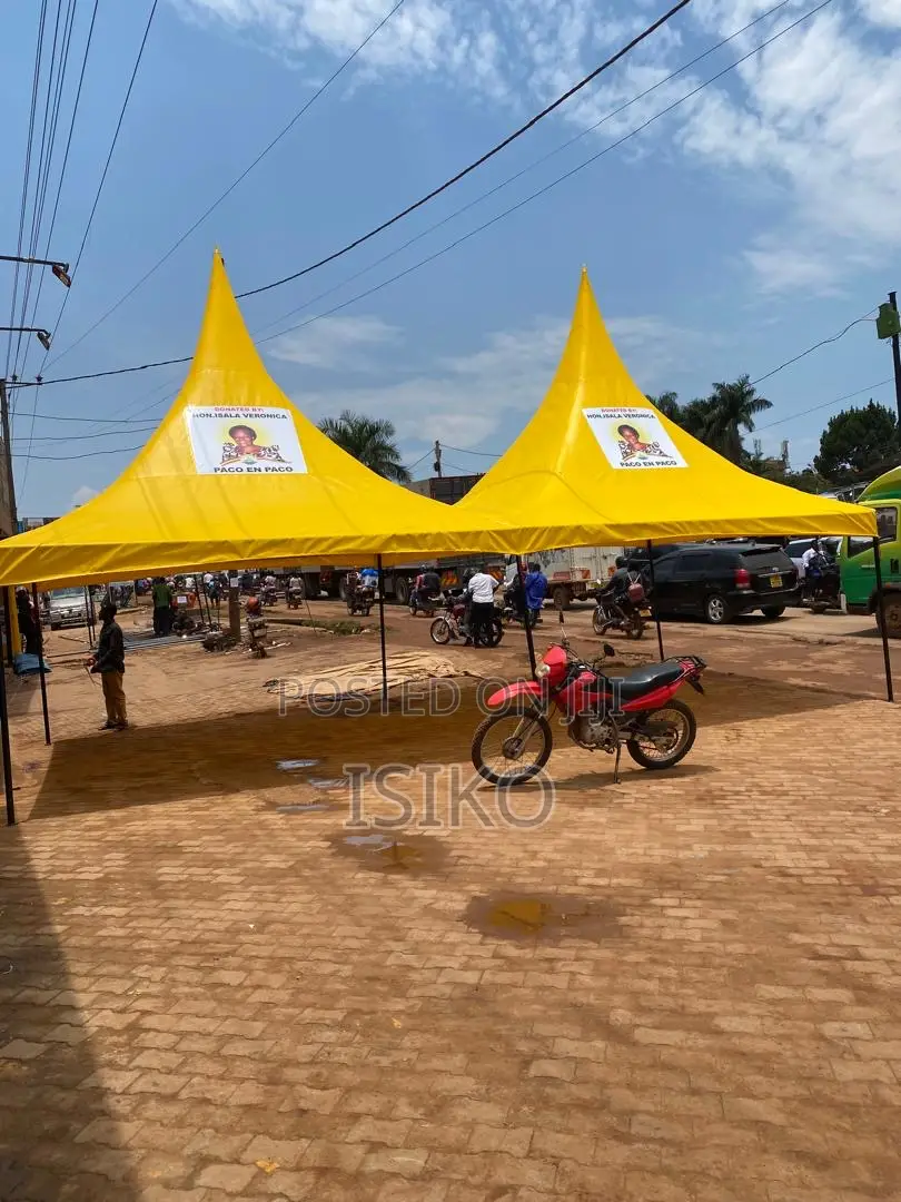 A Yellow African Materialed Double Canopy Tent