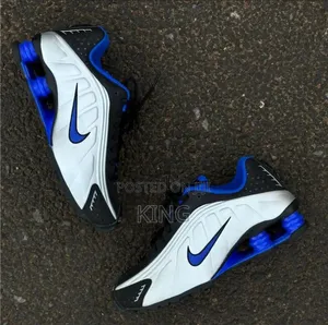 Nike Shox R4 Sneakers in a Metallic Silver and Racer Blue