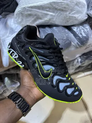 Nike Air Max Plus Drift Sneakers in the "Black Green Strike"