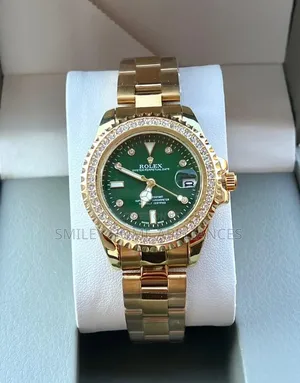 Rolex Women's Original Wrist Time Piece With a Green Face