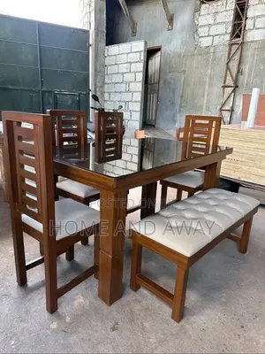6 Seaters 100% Wooden Dining Sets With Ottoman Bench 1,600,000/-