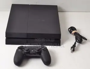 Chipped Ps4 Gaming System With 2 Pads and Many Games