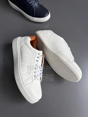 White, Navy, and Black Leather Boss Trainers
