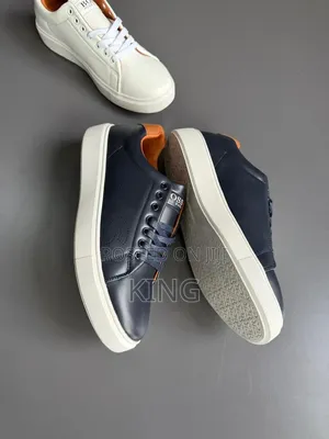 White, Navy, and Black Leather Boss Trainers