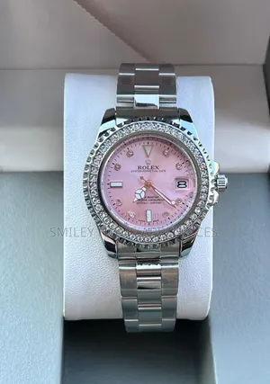 Pink Face Women's Original Rolex Wrist Time Piece With Silver Straps