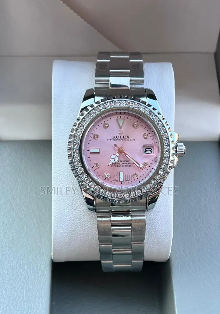 Pink Face Women's Original Rolex Wrist Time Piece With Silver Straps