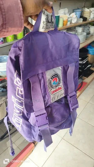 Uk Used Vintage Purple Invicta Backpack.