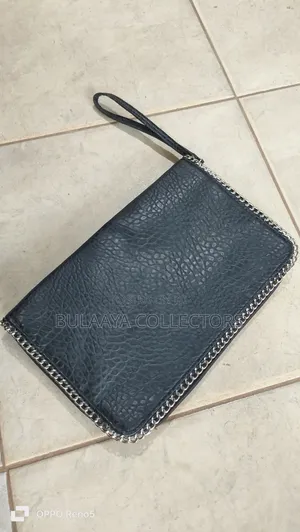 Uk Used Carlos by Carlos Santana Black Clutch Bag.