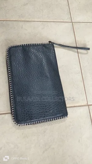 Uk Used Carlos by Carlos Santana Black Clutch Bag.
