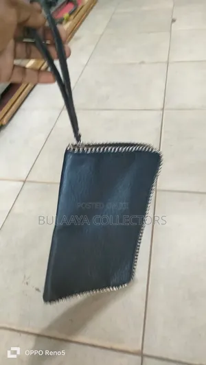 Uk Used Carlos by Carlos Santana Black Clutch Bag.