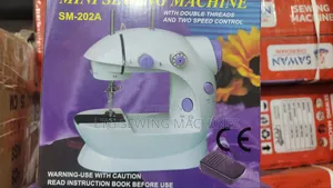 Mini Sewing Machine