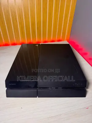 Ps4 Standard With 2 Controllers and Exciting Game Library.