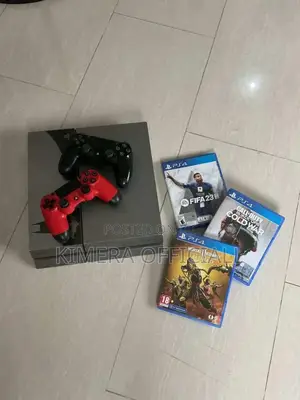 Ps4 With 12 Games + 2pads: Perfect Cure for Kampala Breakdown.