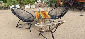A Set Of 4 Seaters Garden Chairs With Epoxy Center Table 1,600,000/-