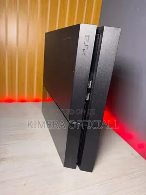 Chipped Playstation 4 Package With Two Controllers.