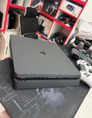 Sony Ps4 Slim Chipped With 2 Controllers and Game Collection